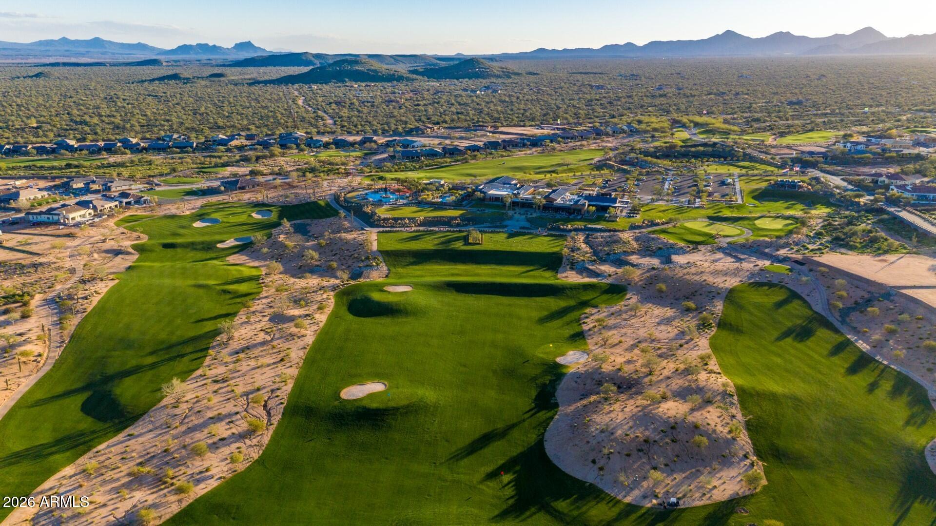 17964 East Wolf Tree Lane Rio Verde, AZ 85263 - Photo 85 of 101 a view of a city with mountains in the background