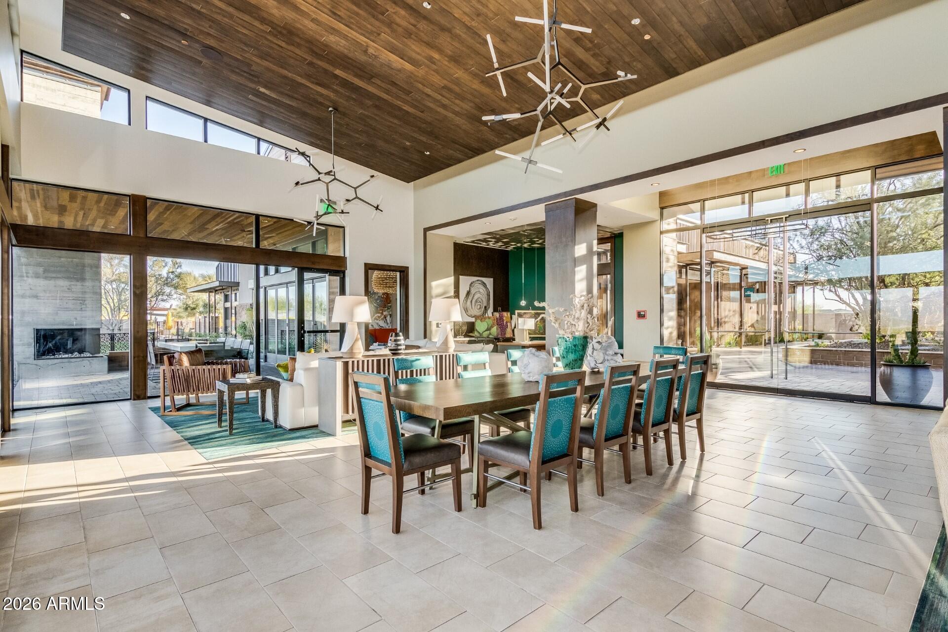 17964 East Wolf Tree Lane Rio Verde, AZ 85263 - Photo 88 of 101 a view of a dining room with furniture window and outside view