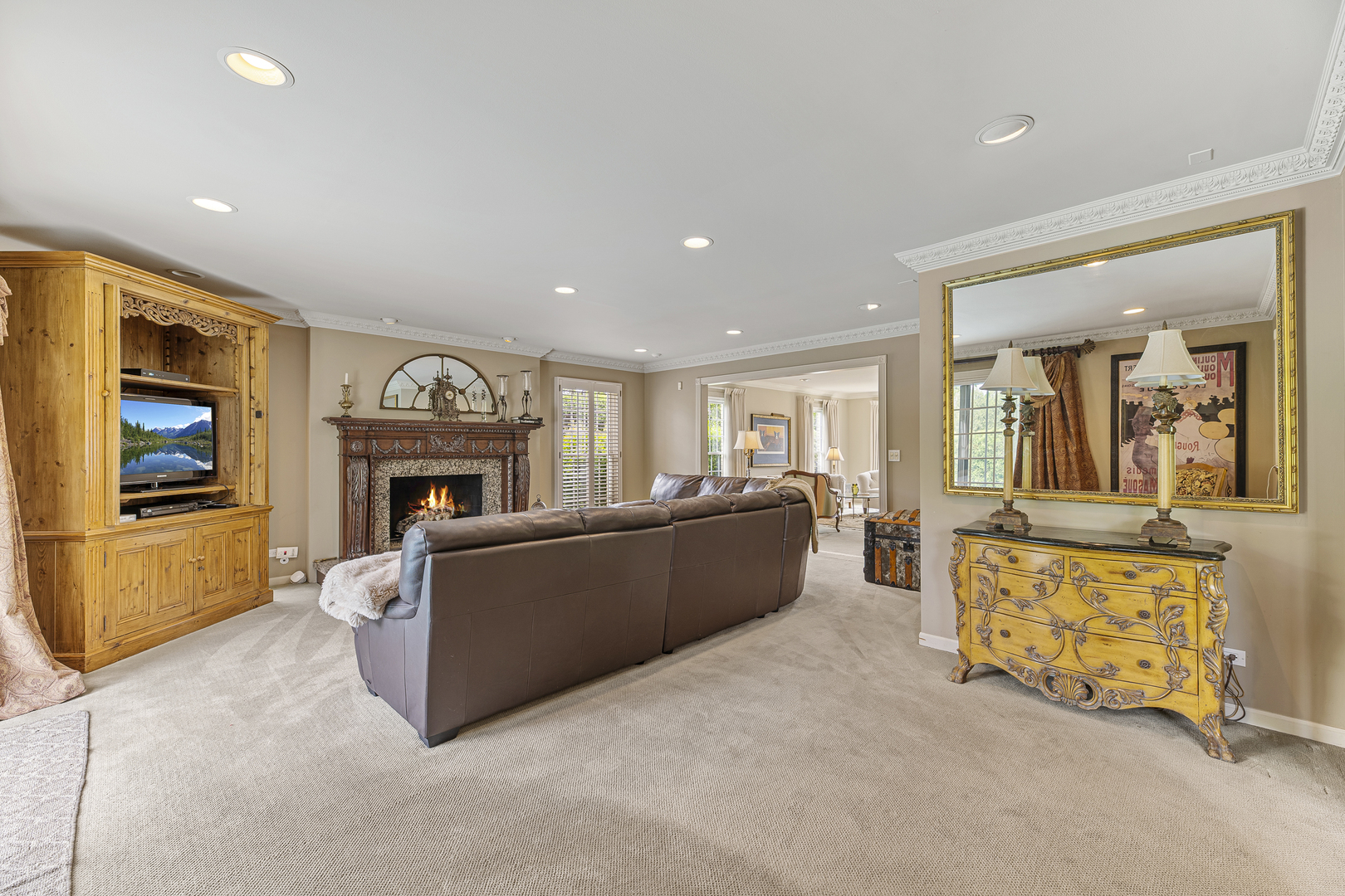2308 Indian Ridge Drive Glenview, IL 60026 - Photo 15 of 60 a living room with furniture and a fireplace