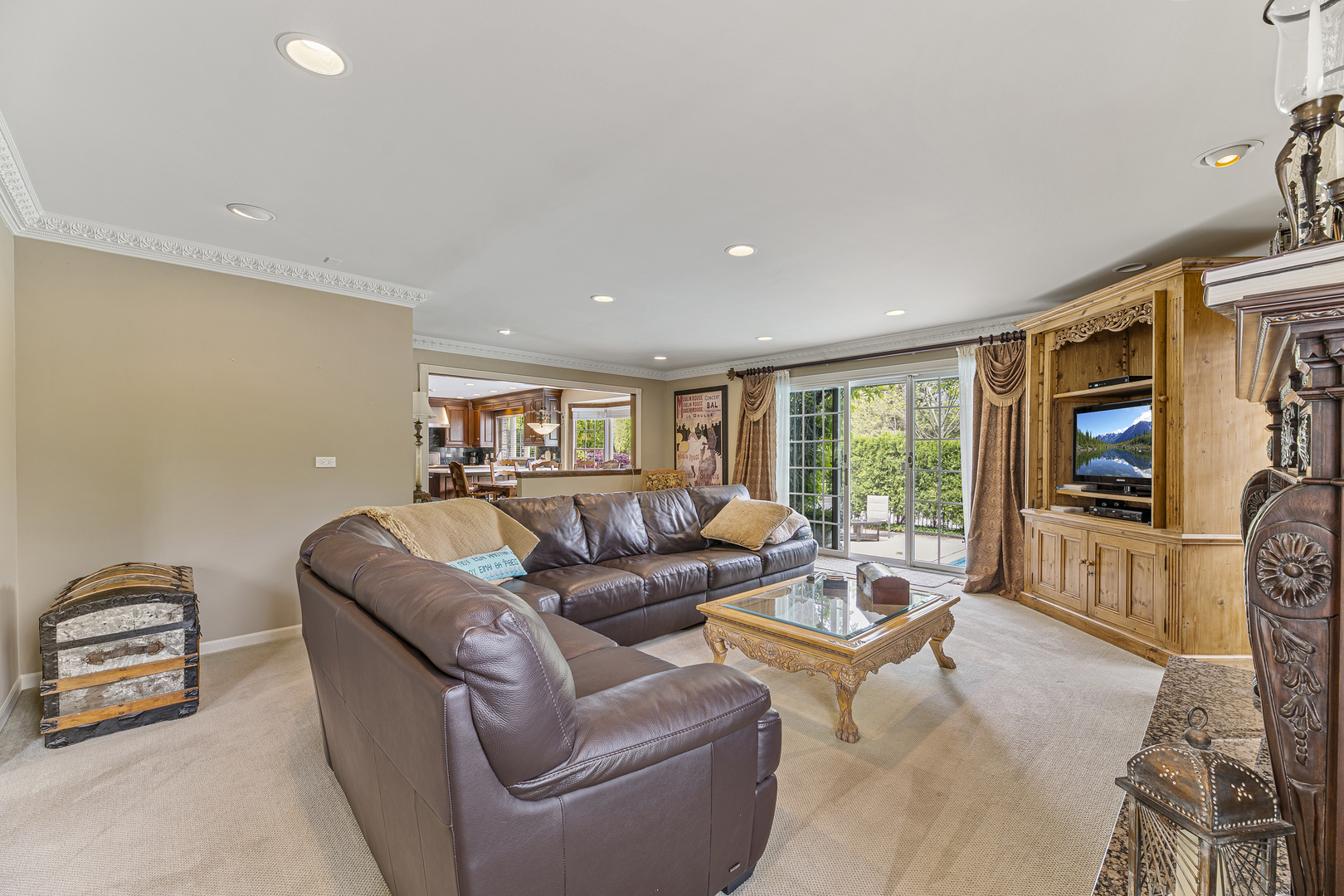 2308 Indian Ridge Drive Glenview, IL 60026 - Photo 16 of 60 a living room with fireplace furniture and a flat screen tv