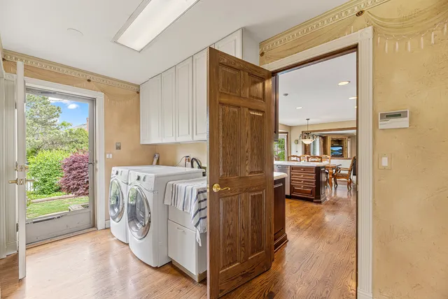 a view of entryway with wooden floor