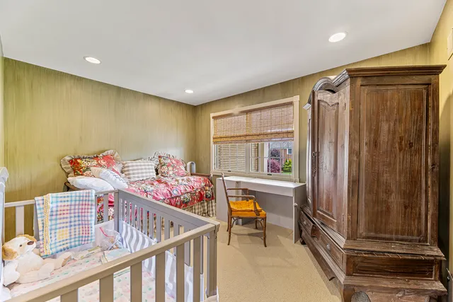 an empty room with white walls and white walls