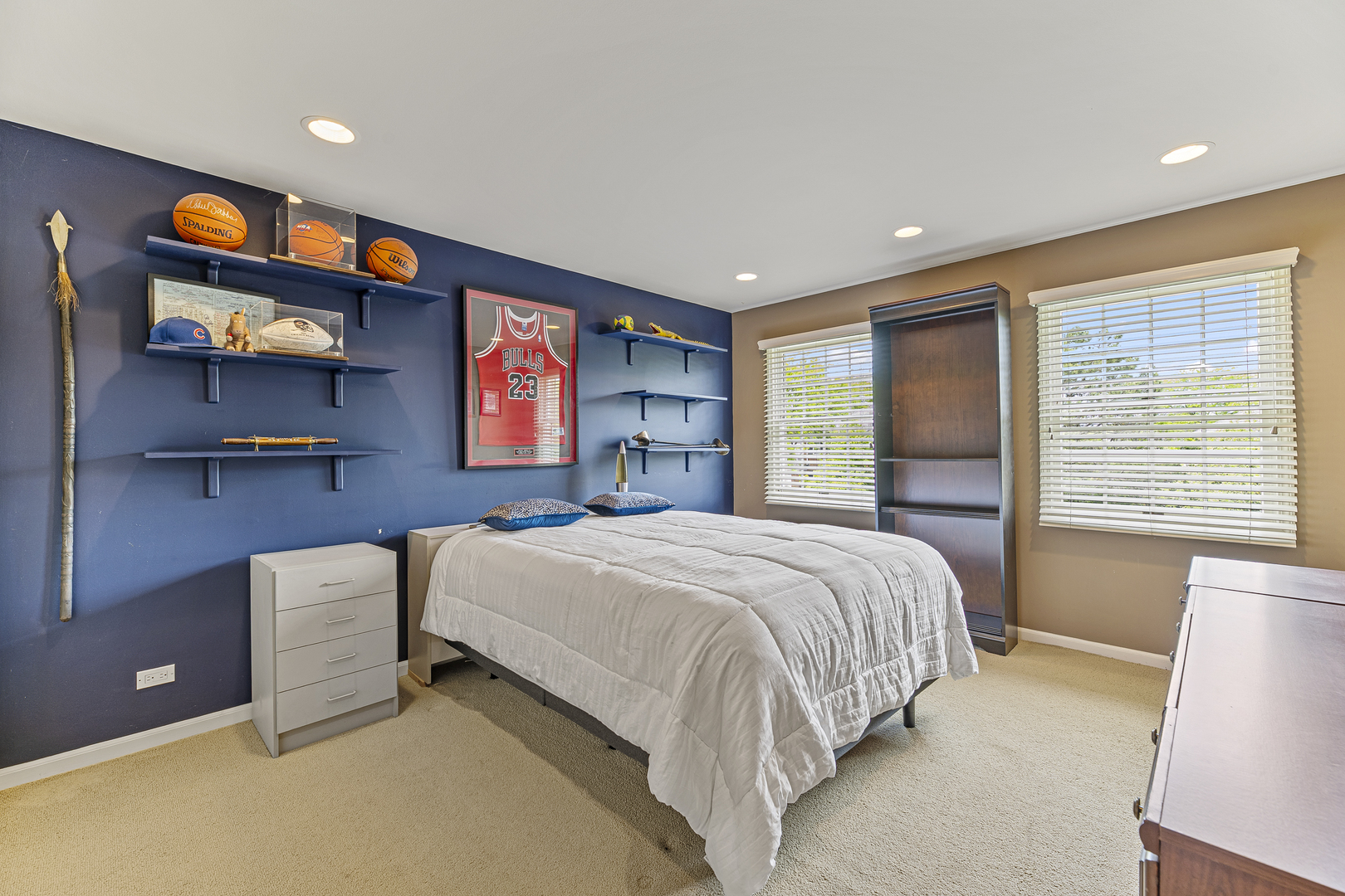 2308 Indian Ridge Drive Glenview, IL 60026 - Photo 32 of 60 a bedroom with a bed and a couch