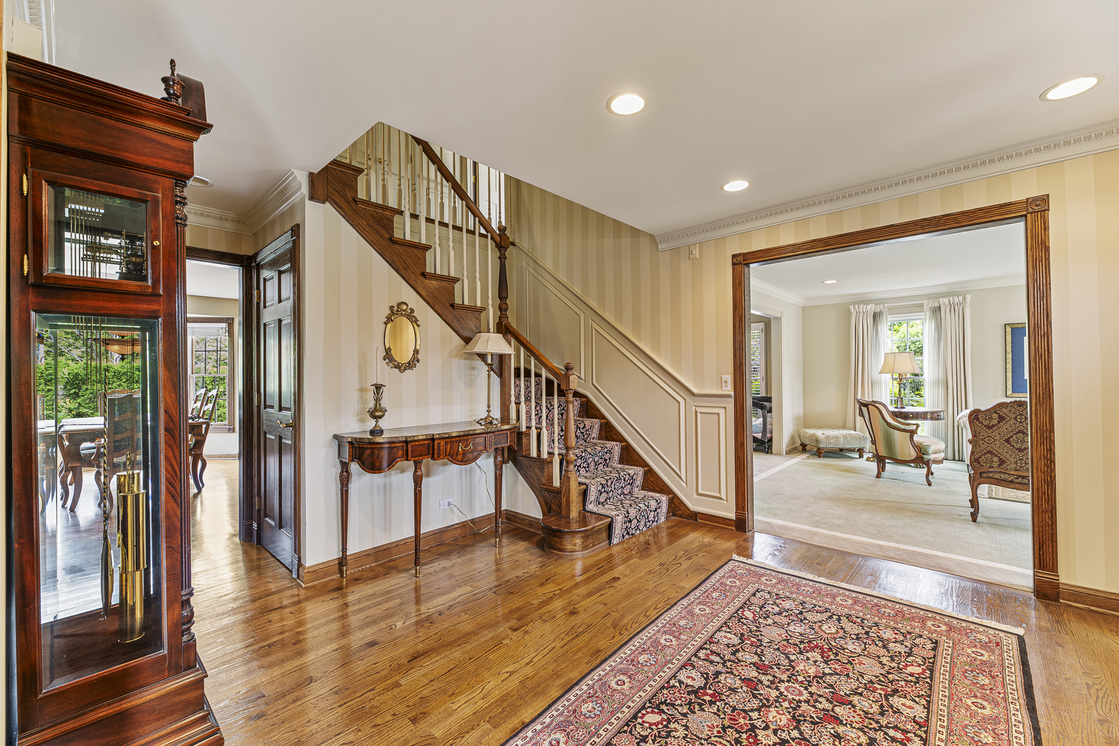 2308 Indian Ridge Drive Glenview, IL 60026 - Photo 4 of 60 a view of staircase with furniture and a rug