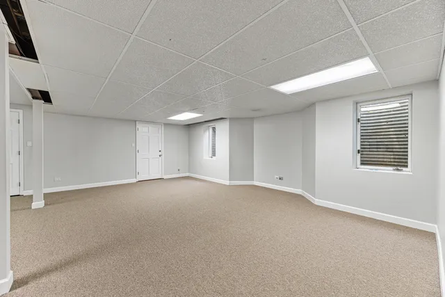 a swimming pool with outdoor seating yard and patio