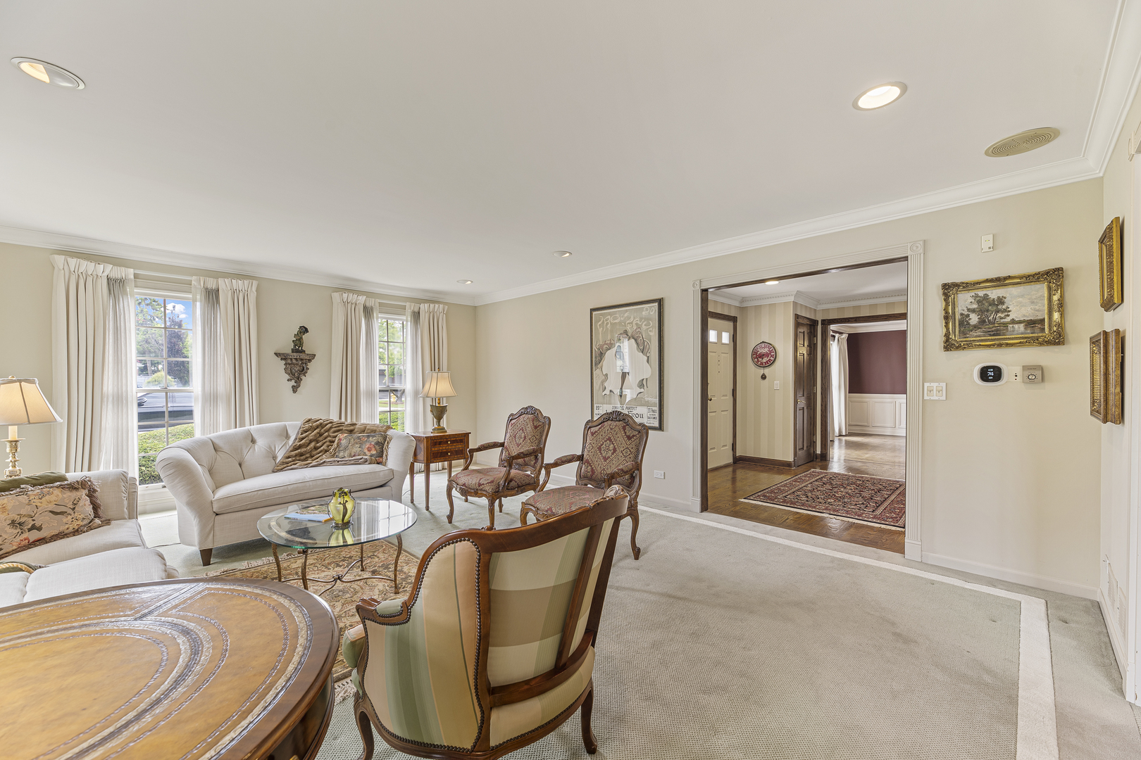 2308 Indian Ridge Drive Glenview, IL 60026 - Photo 7 of 60 a living room with furniture a large window and wooden floor
