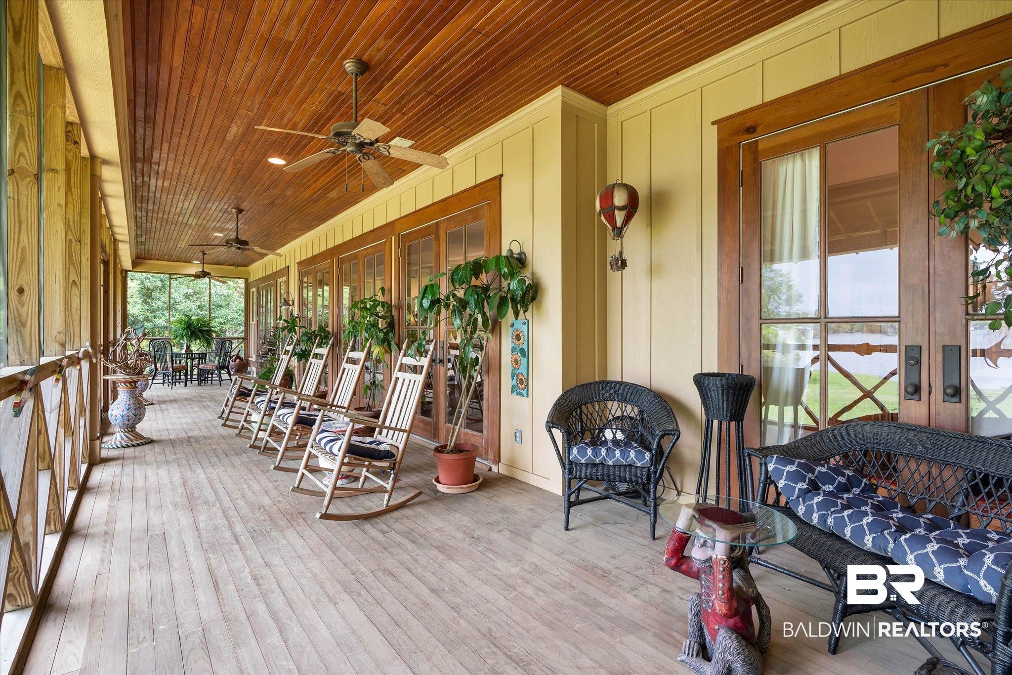 2300 Burgett Road Mobile, AL 36605 - Photo 22 of 40 Wooden terrace with french doors and ceiling fan