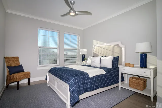 a bedroom with a bed and a chair