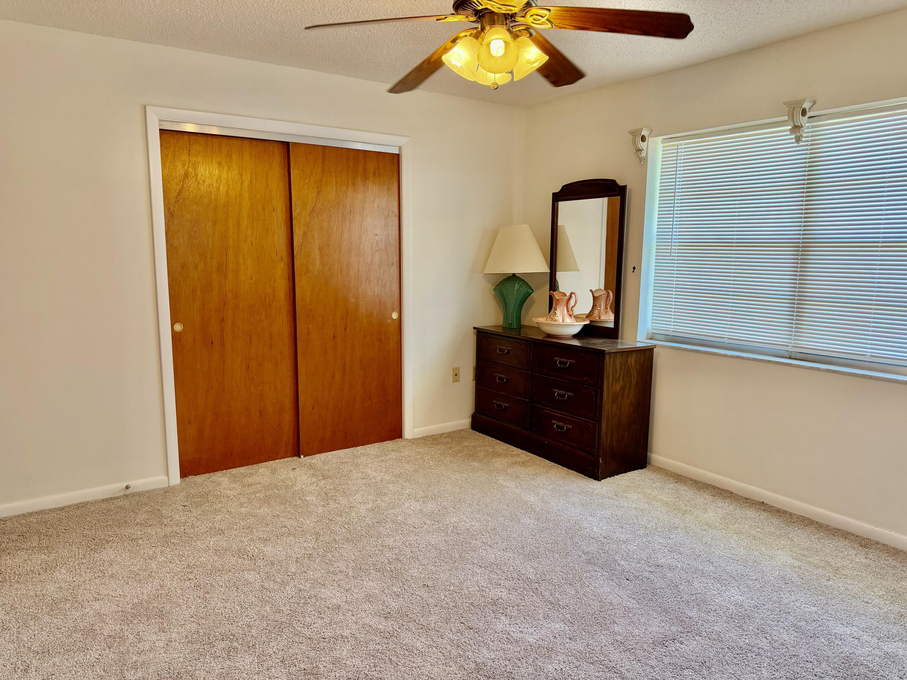 3283 Southwest 20th Street Okeechobee, FL 34974 - Photo 9 of 19 a view of an empty room with a window