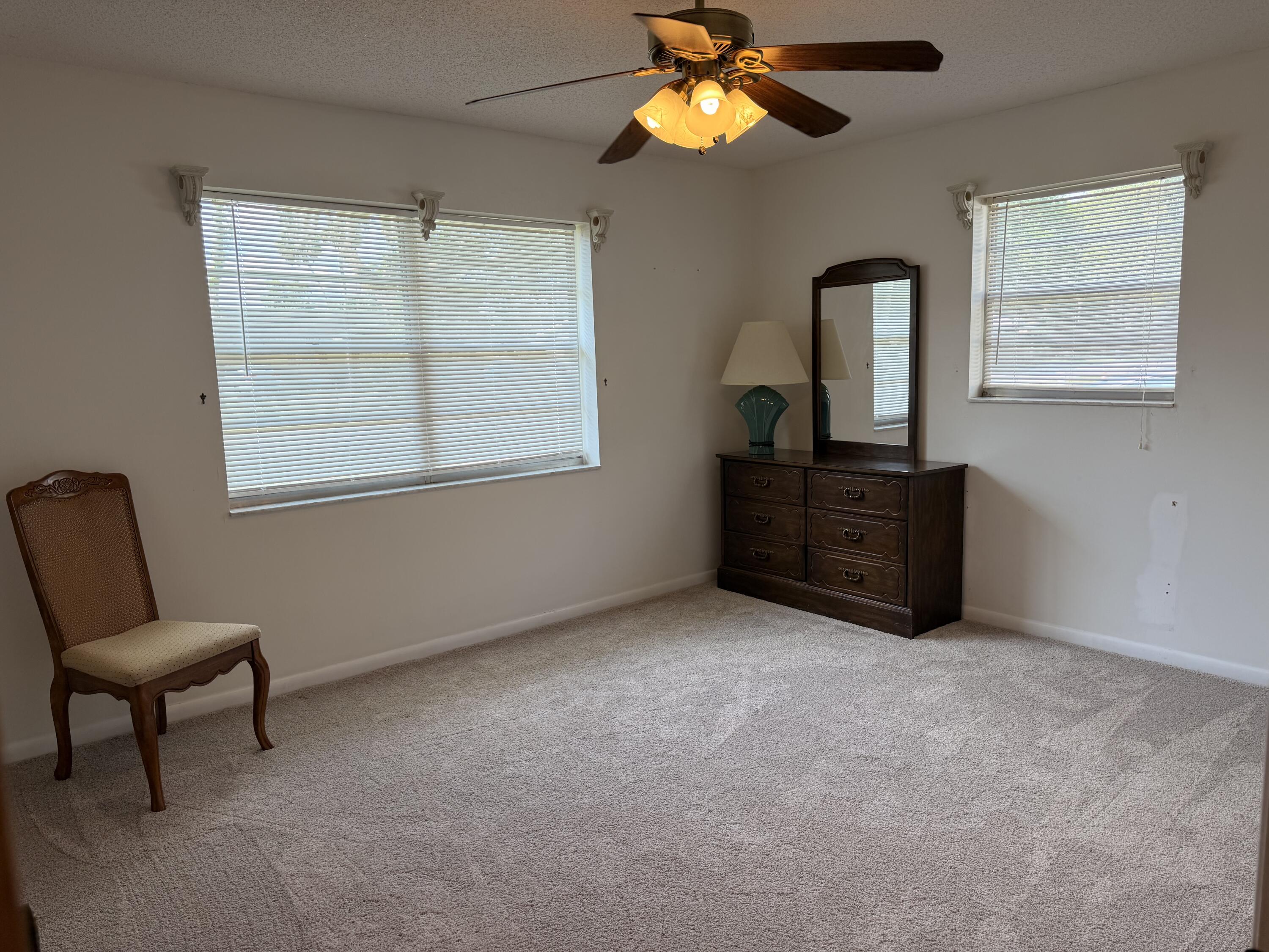 3283 Southwest 20th Street Okeechobee, FL 34974 - Photo 10 of 19 a view of a livingroom with furniture and a window