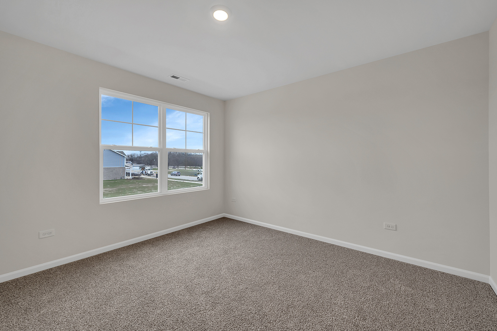 6720 Applegate Drive Plainfield, IL 60586 - Photo 13 of 17 a view of an empty room with a window