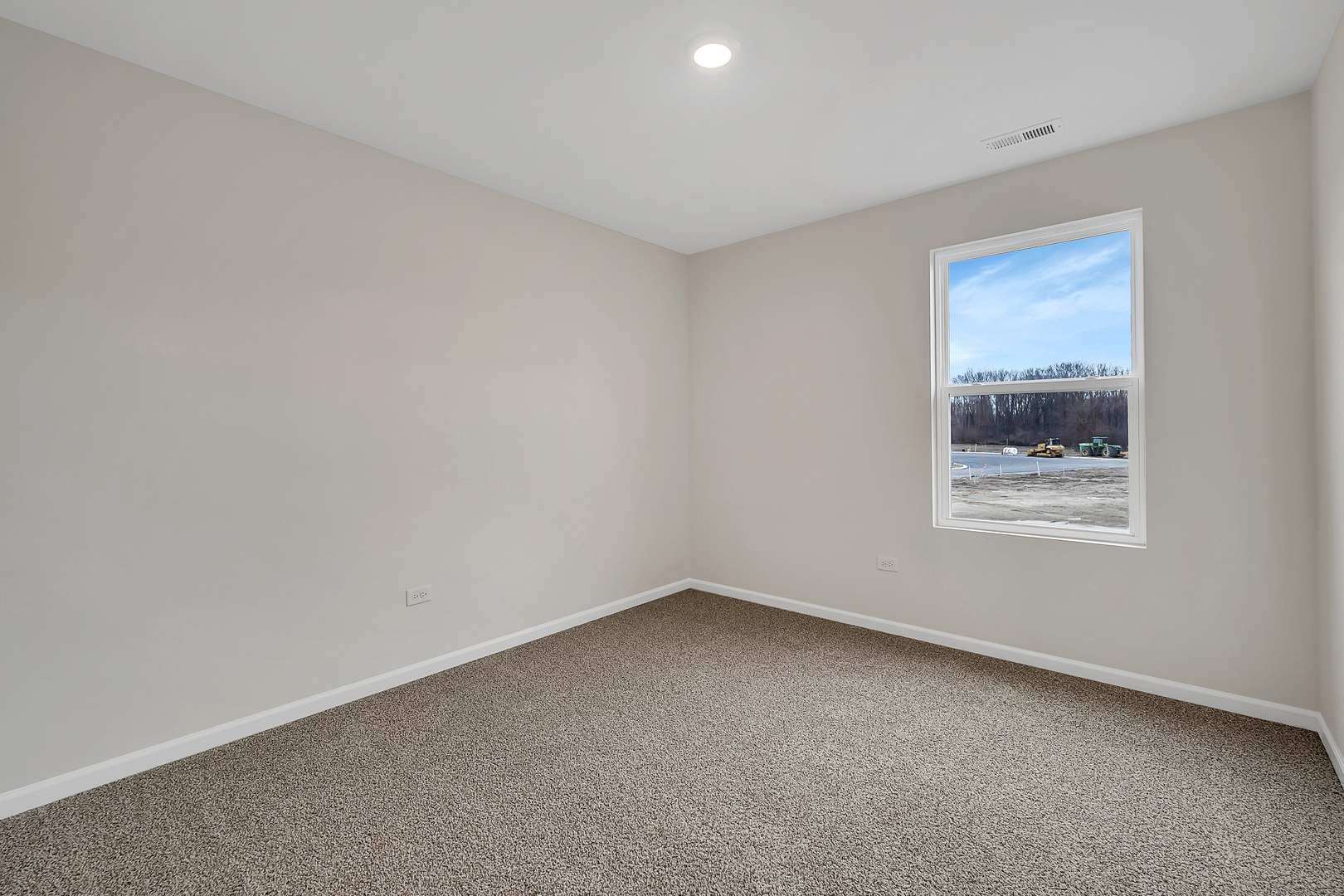 6720 Applegate Drive Plainfield, IL 60586 - Photo 15 of 17 a view of an empty room with a window