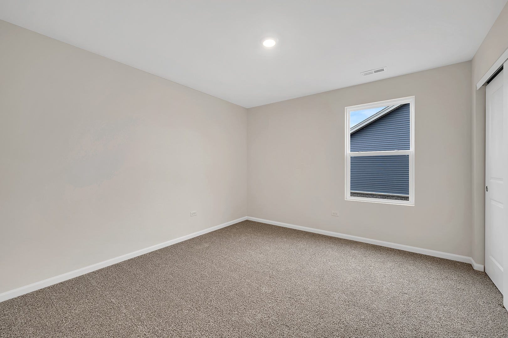 6720 Applegate Drive Plainfield, IL 60586 - Photo 16 of 17 an empty room with a window