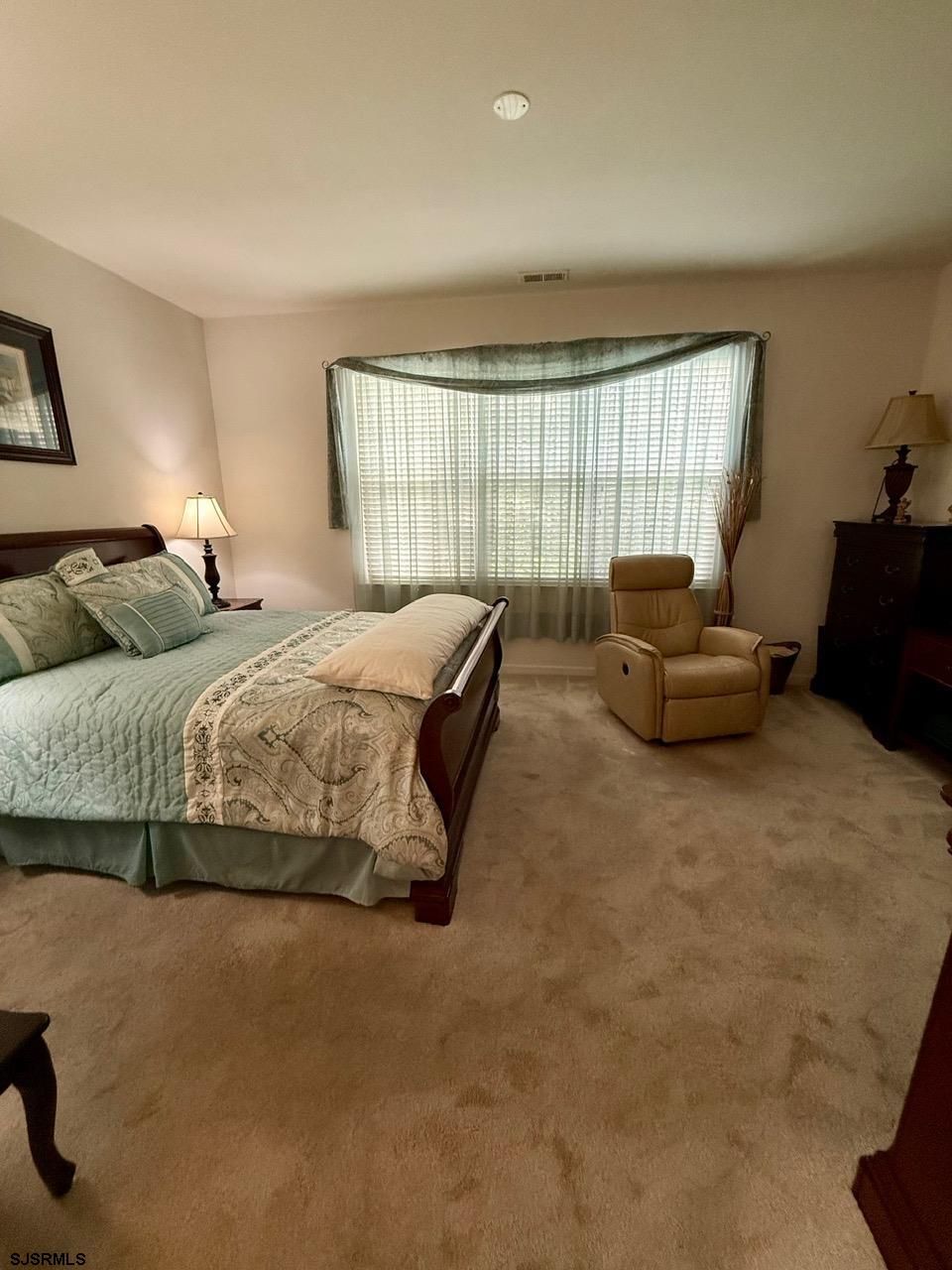 36 West Delray Lane Absecon, NJ 08201 - Photo 16 of 23 a bedroom with bed couch and window