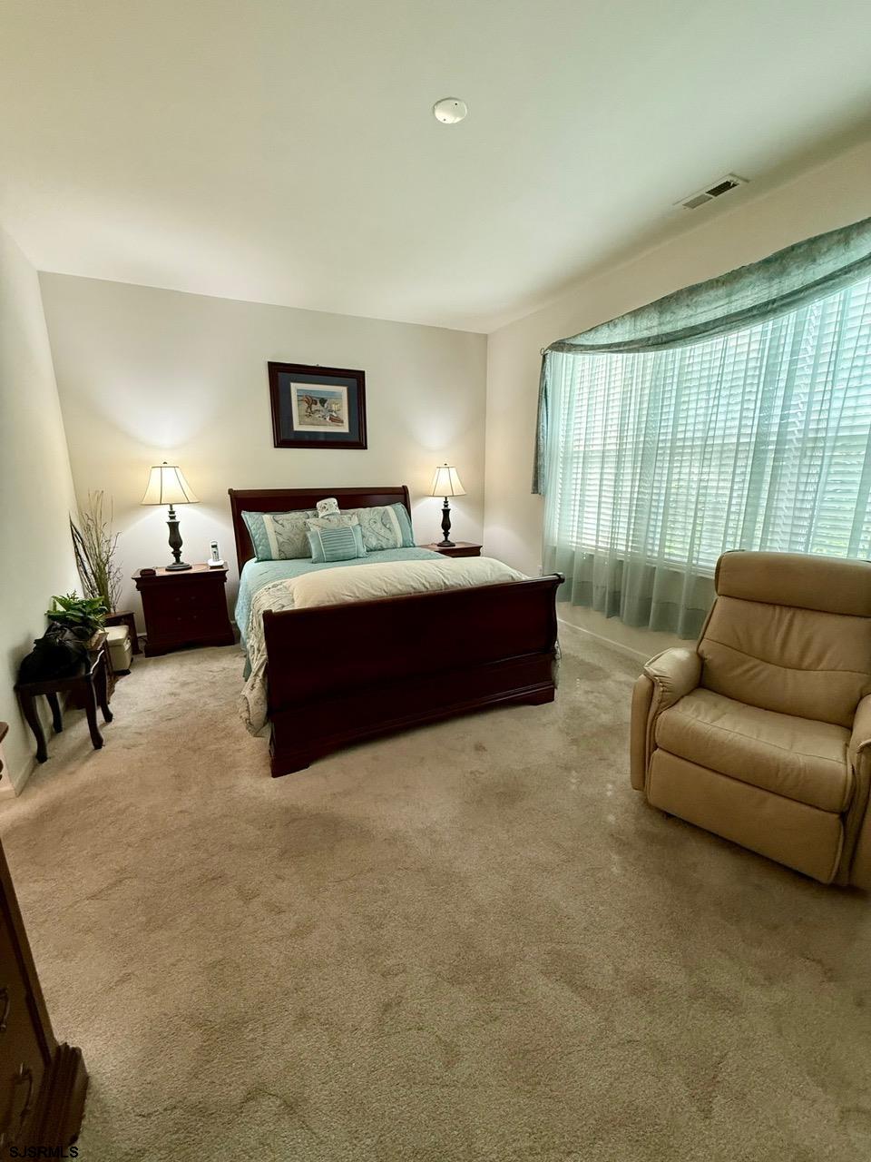 36 West Delray Lane Absecon, NJ 08201 - Photo 17 of 23 a living room with furniture and a large window