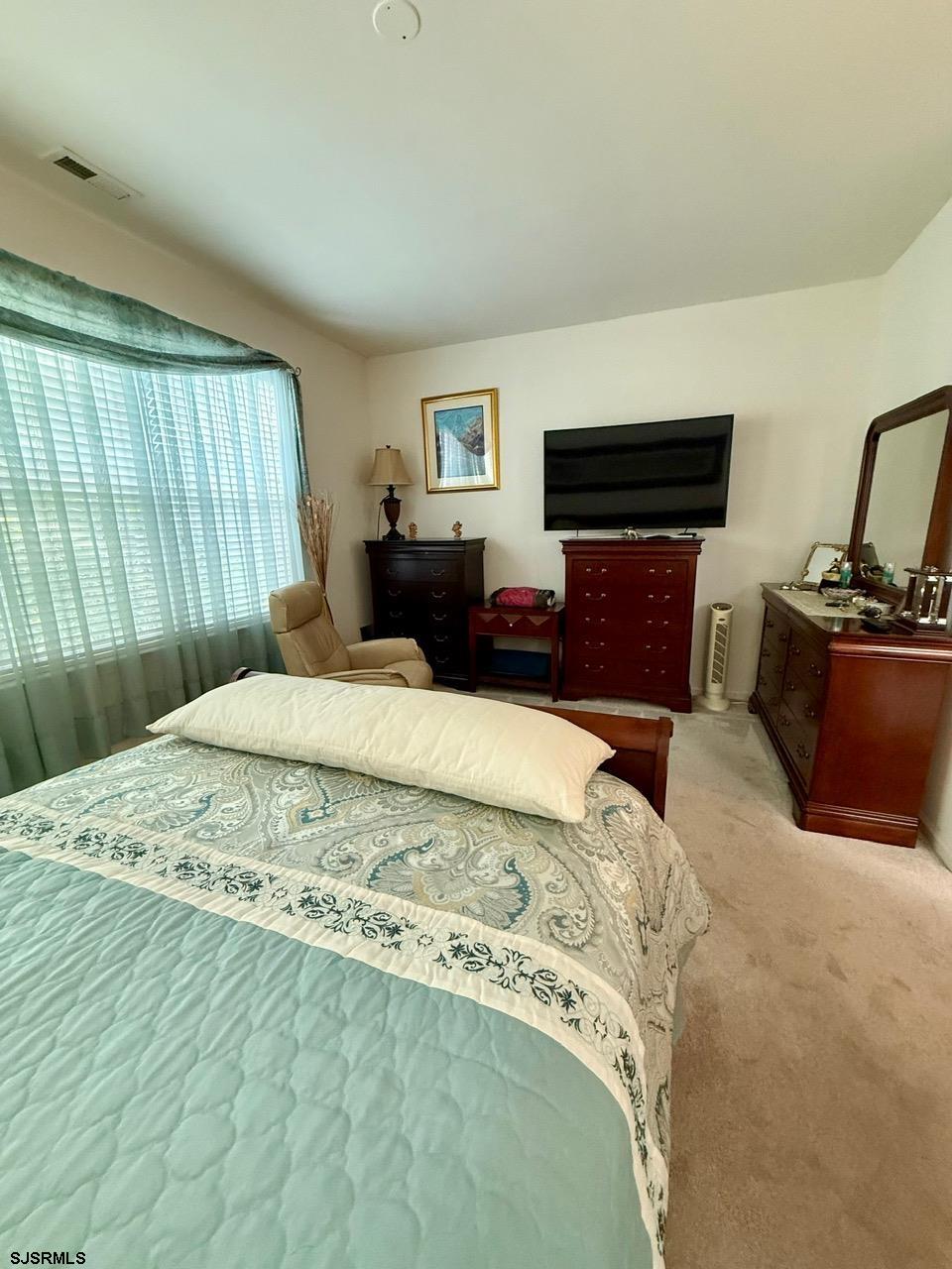 36 West Delray Lane Absecon, NJ 08201 - Photo 18 of 23 a bed sitting in a bedroom and furniture