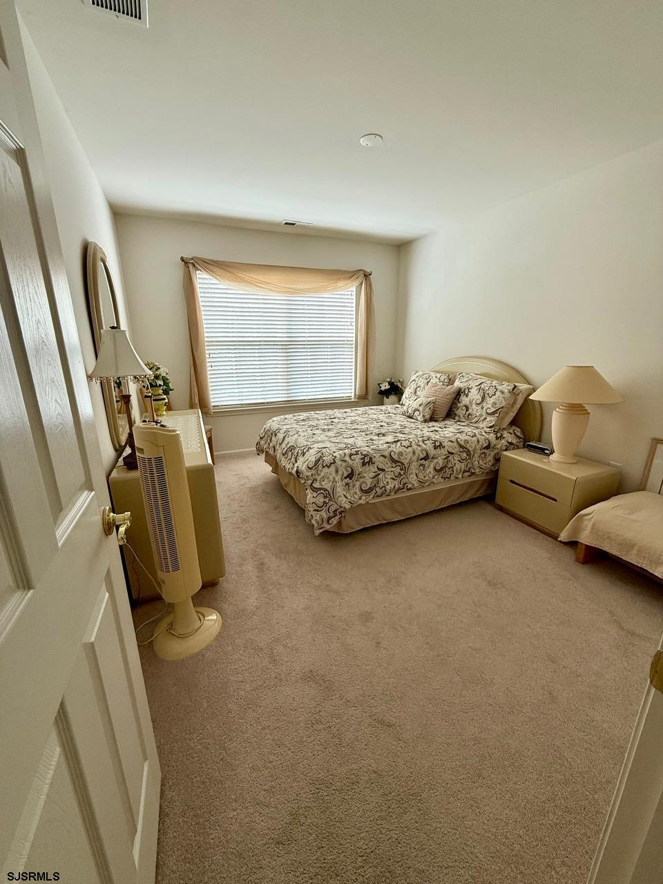 36 West Delray Lane Absecon, NJ 08201 - Photo 20 of 23 a bedroom with bed and window