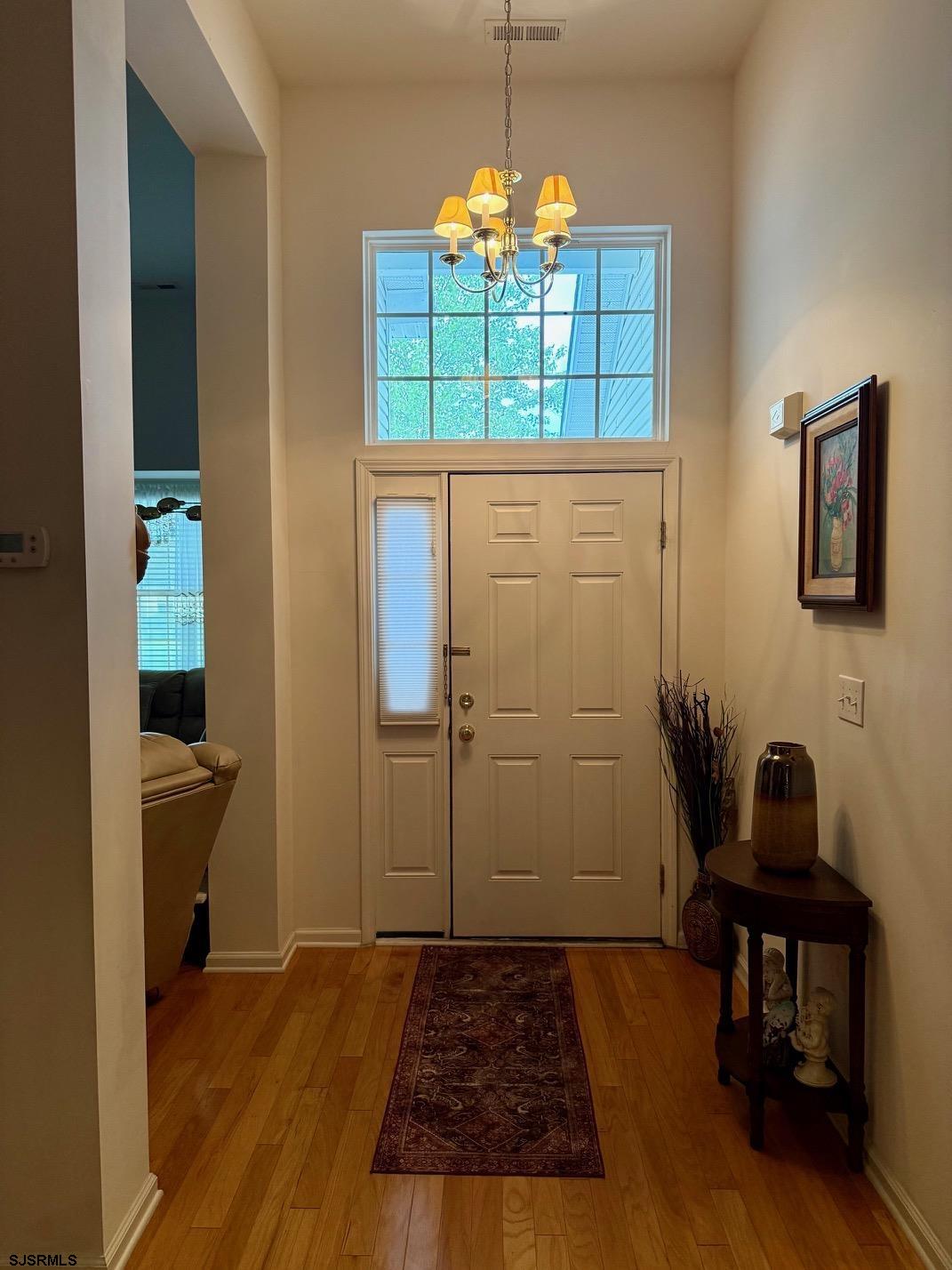36 West Delray Lane Absecon, NJ 08201 - Photo 22 of 23 a view of a livingroom with furniture and wooden floor