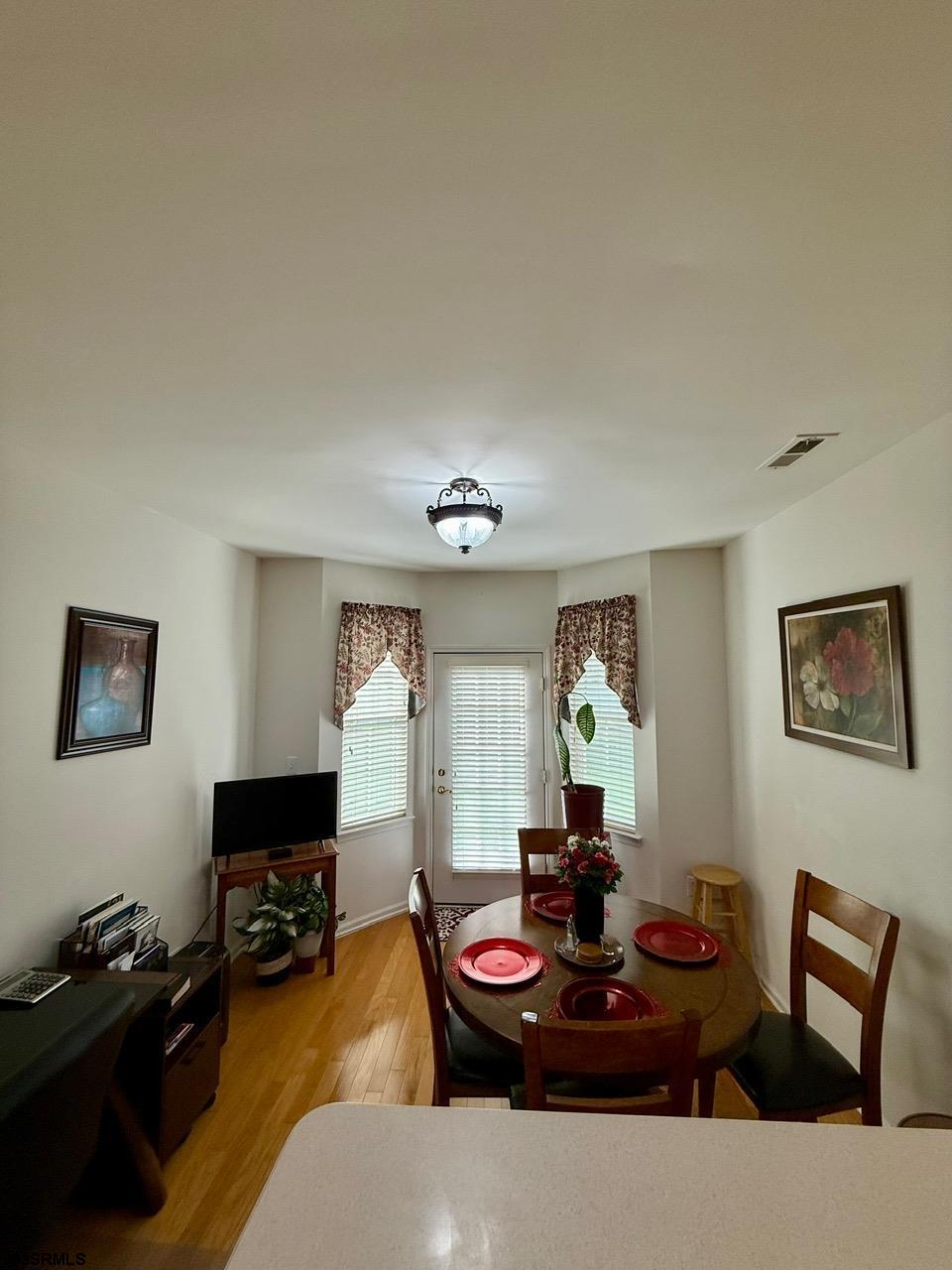 36 West Delray Lane Absecon, NJ 08201 - Photo 5 of 23 a living room with furniture and a flat screen tv
