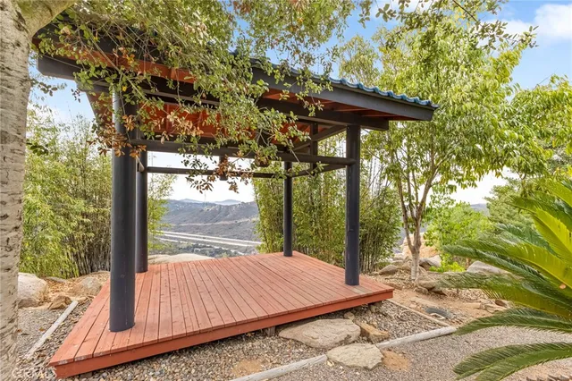 a view of a backyard with a patio