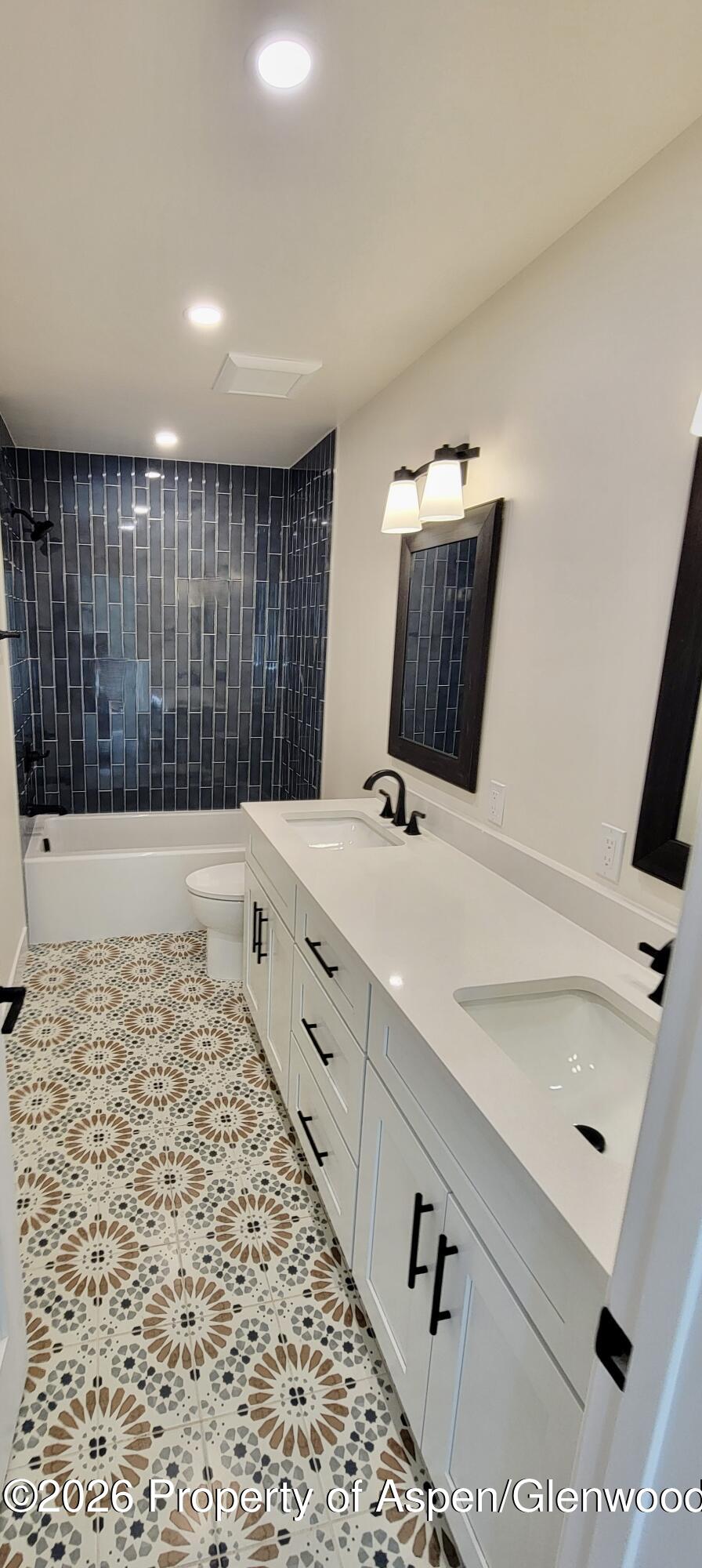 511 Last Chance Drive Rifle, CO 81650 - Photo 11 of 14 a bathroom with a sink and a mirror