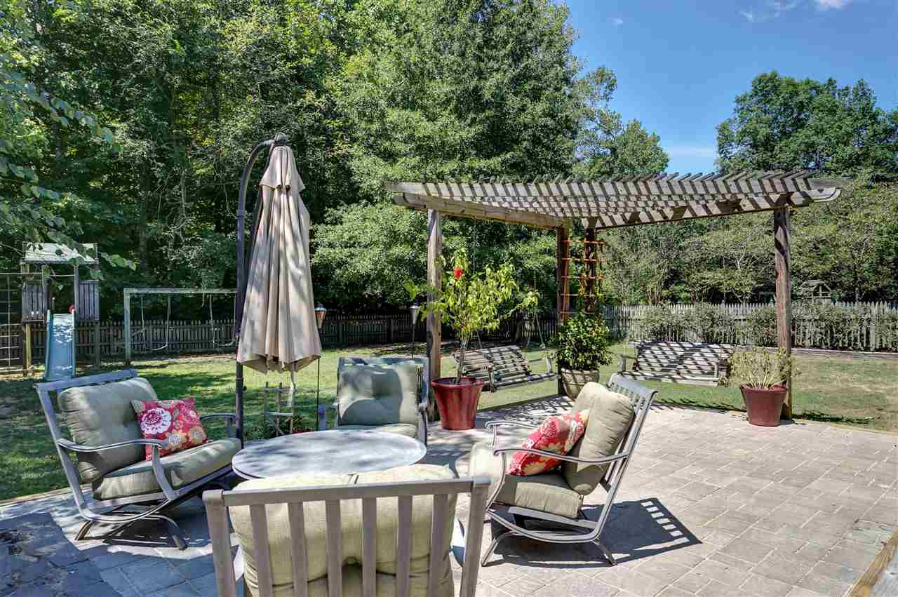 1612 Patterson Grove Road Apex, NC 27502 - Photo 22 of 25 MUST SEE Yard! Incredible space - custom patio shown here. Patio