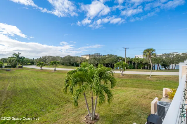 a view of a lake with a big yard