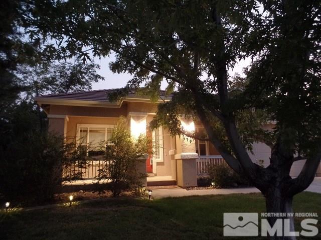 5951 North White Sands Road Reno, NV 89511 - Photo 3 of 3 front view of house with a yard