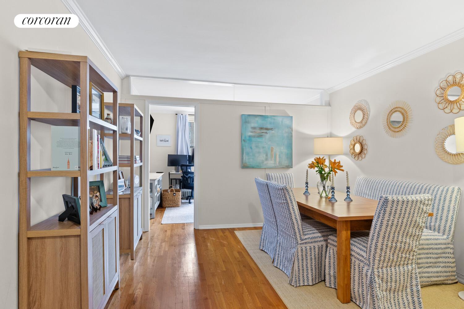 25 West 13th Street, Unit 3FN Manhattan, NY 10011 - Photo 3 of 20 a dining room with furniture and wooden floor