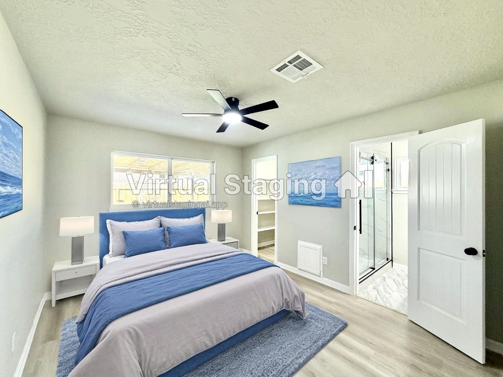 1710 Beaver Bend Road Houston, TX 77088 - Photo 14 of 32 a bedroom with a large bed and a window