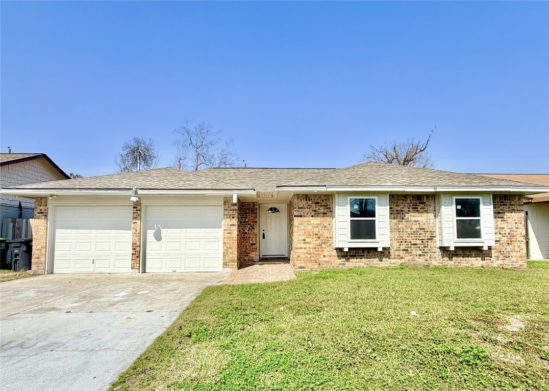 1710 Beaver Bend Road Houston, TX 77088 - Photo 29 of 32 a front view of a house with garden
