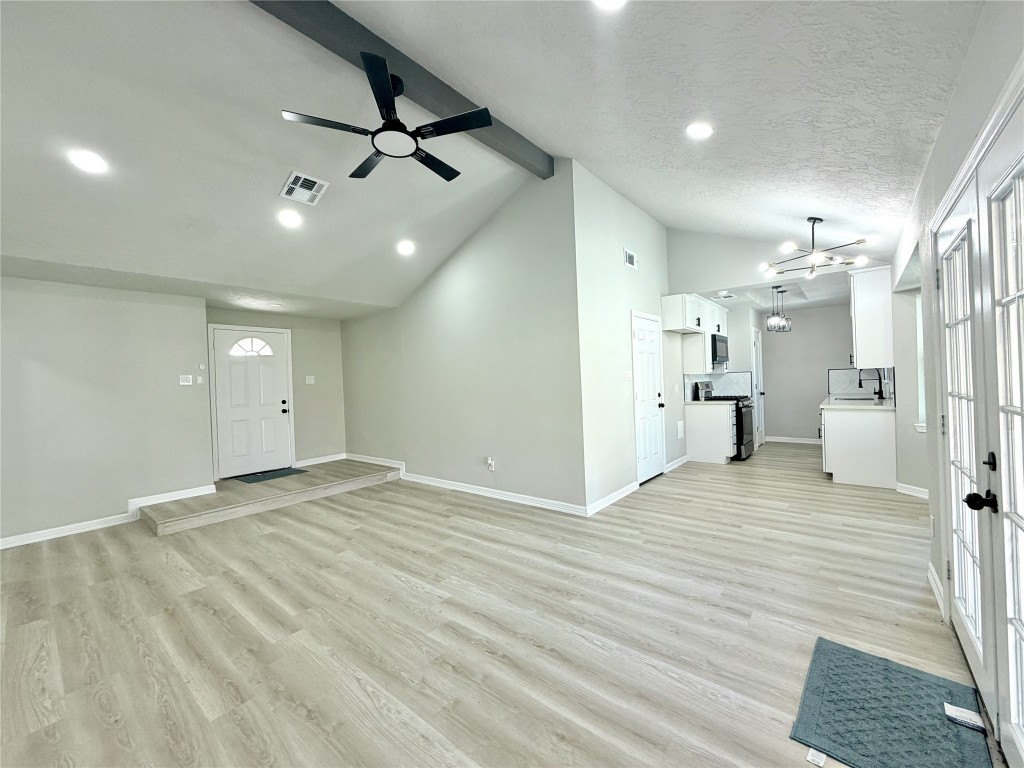 1710 Beaver Bend Road Houston, TX 77088 - Photo 3 of 32 a view of a livingroom with a chandelier