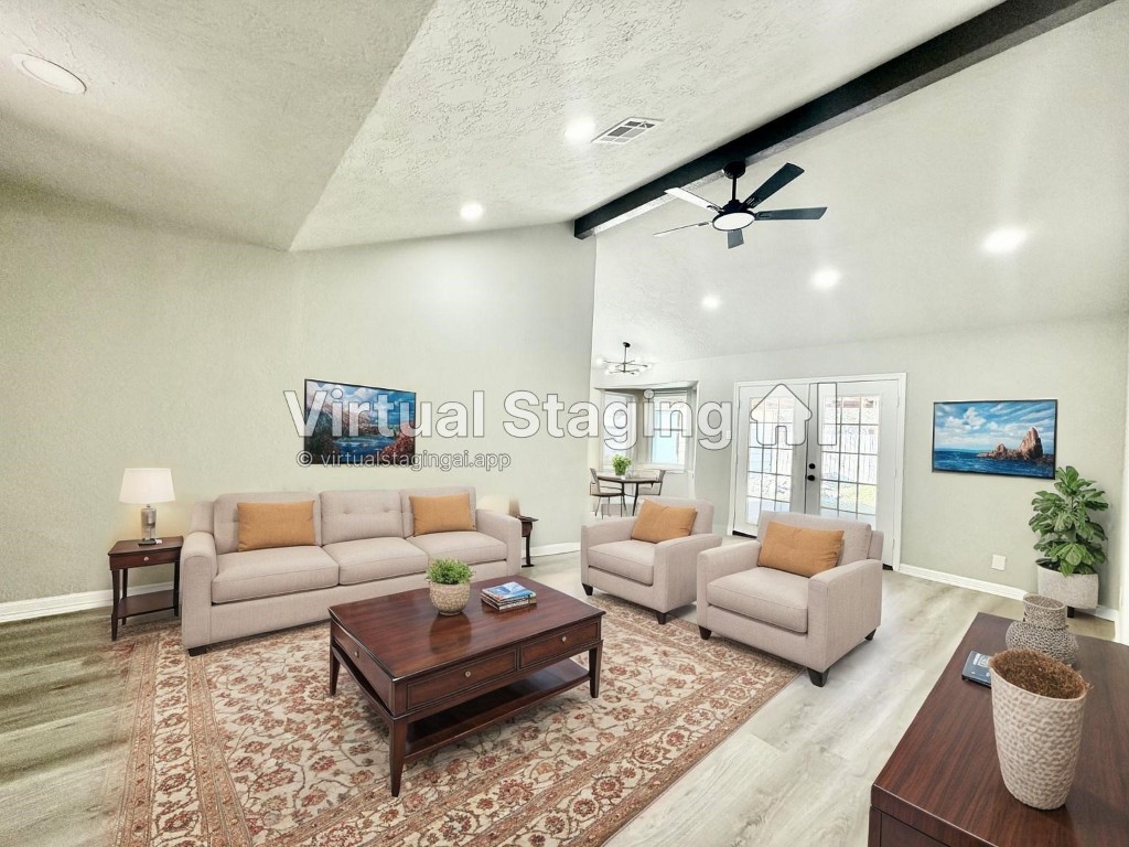 1710 Beaver Bend Road Houston, TX 77088 - Photo 5 of 32 a living room with furniture and a large window