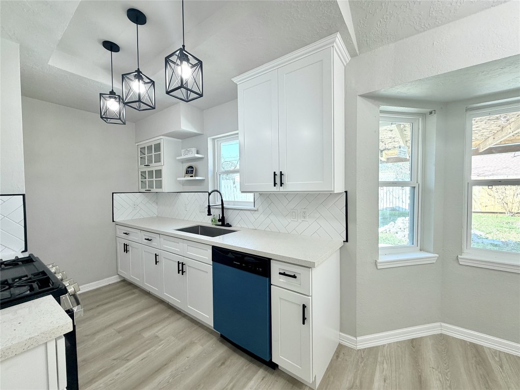 1710 Beaver Bend Road Houston, TX 77088 - Photo 10 of 32 a kitchen with a sink and dishwasher