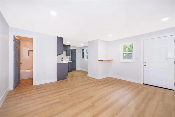 a view of kitchen with wooden floor