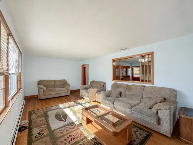 a living room with furniture and a couch