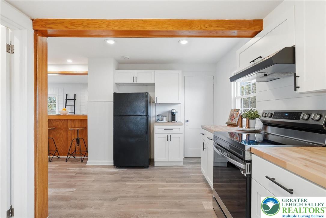 292 Walter Road Chalfont, PA 18914 - Photo 14 of 35 a kitchen with stainless steel appliances granite countertop a refrigerator and a stove