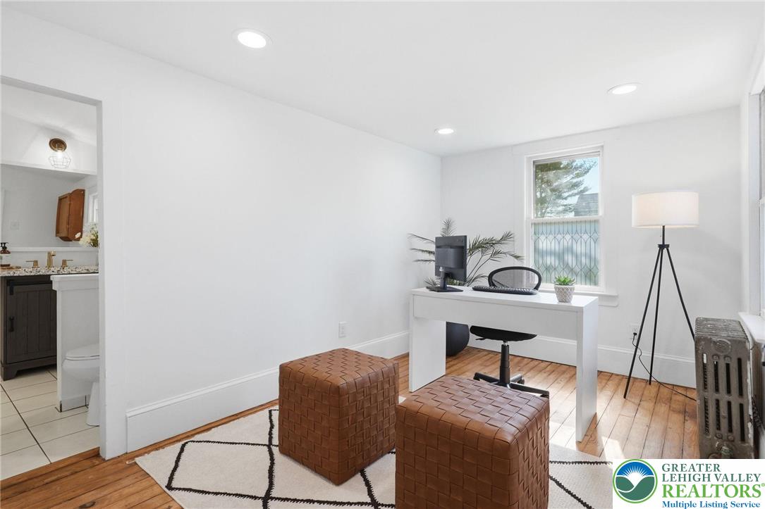 292 Walter Road Chalfont, PA 18914 - Photo 24 of 35 a view of a workspace with furniture and wooden floor