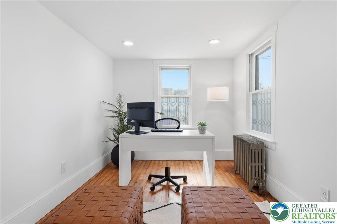 292 Walter Road Chalfont, PA 18914 - Photo 25 of 35 a view of a hallway with a couch and chandelier