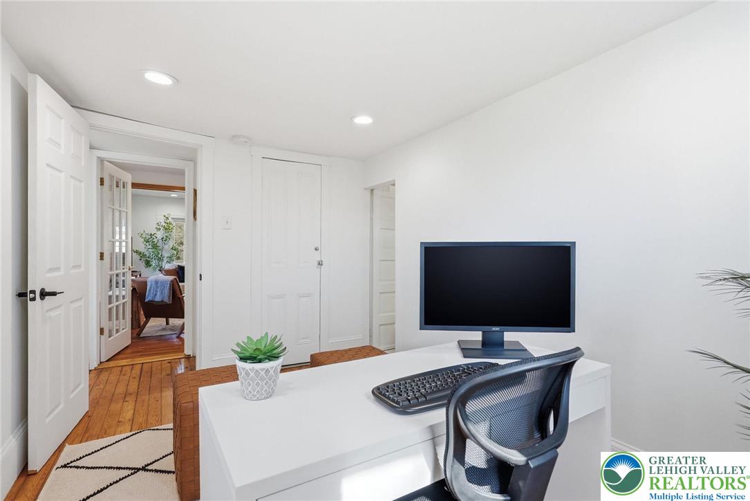 292 Walter Road Chalfont, PA 18914 - Photo 27 of 35 a living room with furniture and a flat screen tv