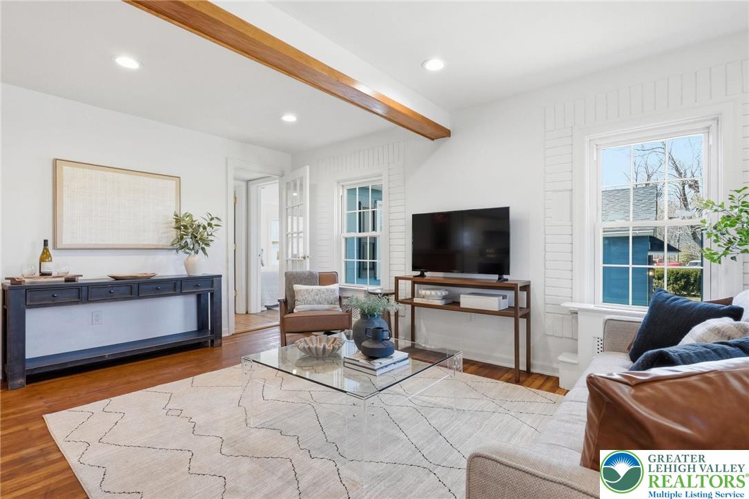 292 Walter Road Chalfont, PA 18914 - Photo 3 of 35 a living room with furniture and a flat screen tv