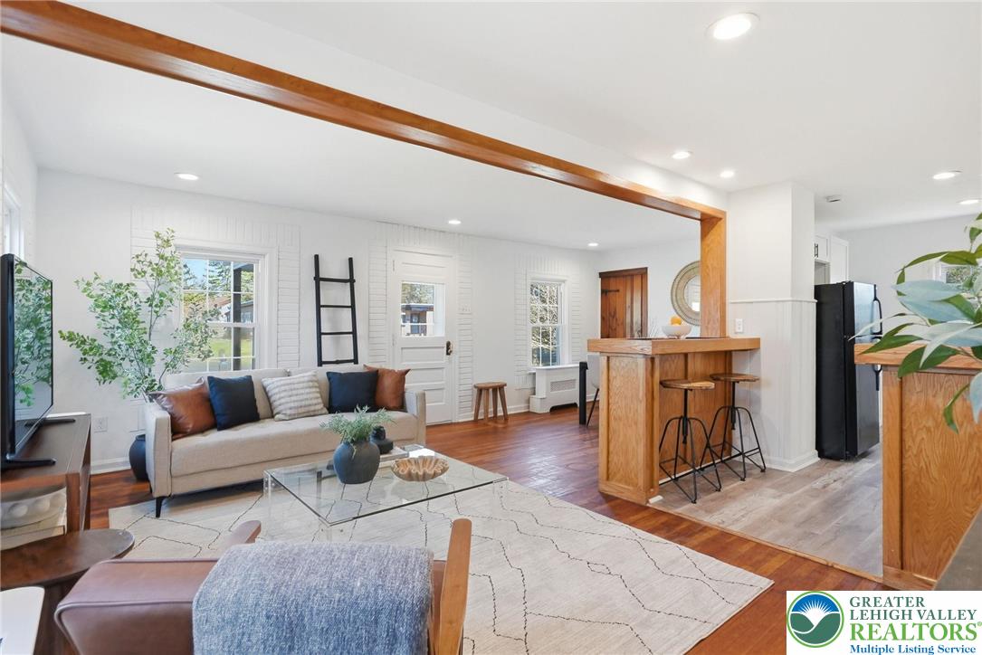 292 Walter Road Chalfont, PA 18914 - Photo 5 of 35 a living room with furniture and a wooden floor