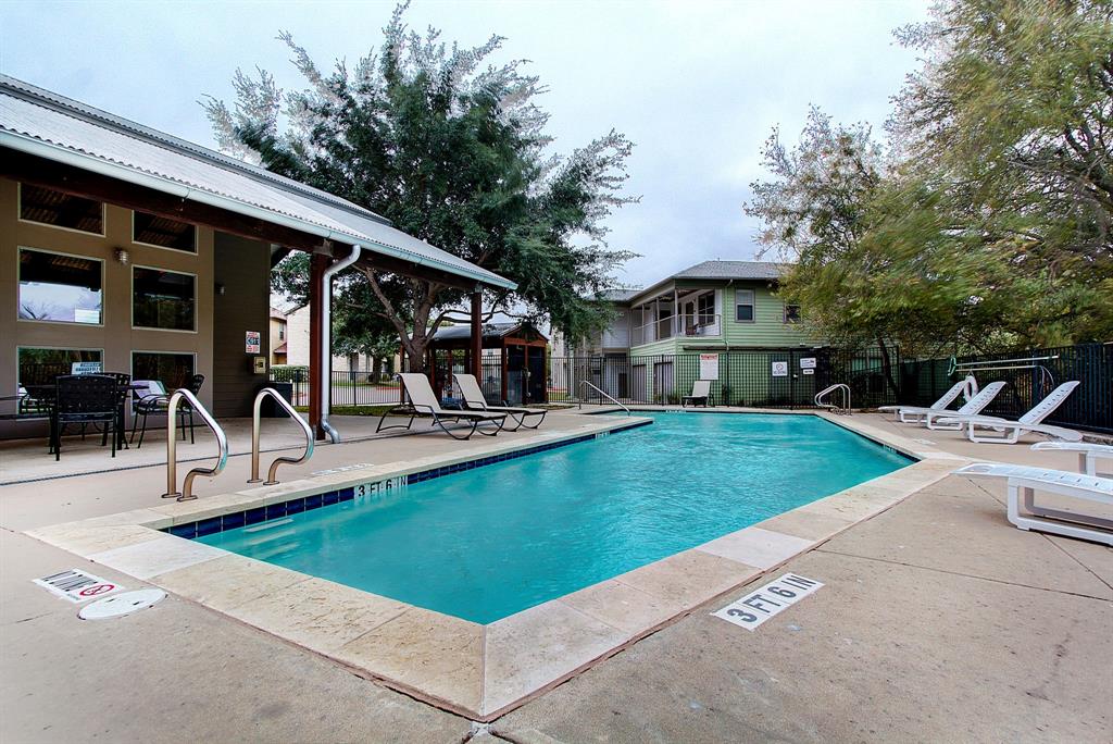 1201 Grove Boulevard, Unit 1701 Austin, TX 78741 - Photo 10 of 10 a view of a house with pool porch and chairs