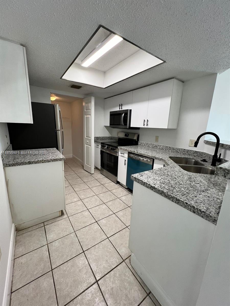 5065 Wiles Road, Unit 103 Coconut Creek, FL 33073 - Photo 7 of 20