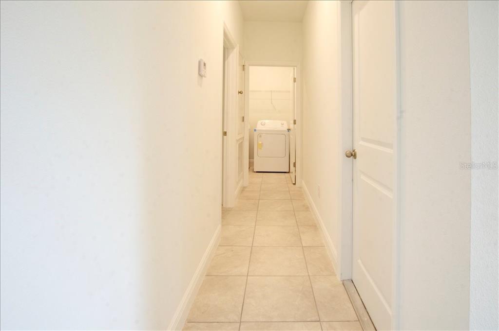 6952 Southwest 152nd Street Ocala, FL 34473 - Photo 6 of 25 a bathroom with a sink and a mirror