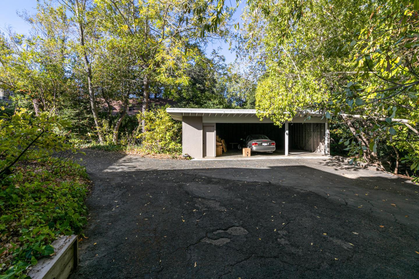 170 Bridge Road Hillsborough, CA 94010 - Photo 11 of 15 a view of an house with backyard space and garden