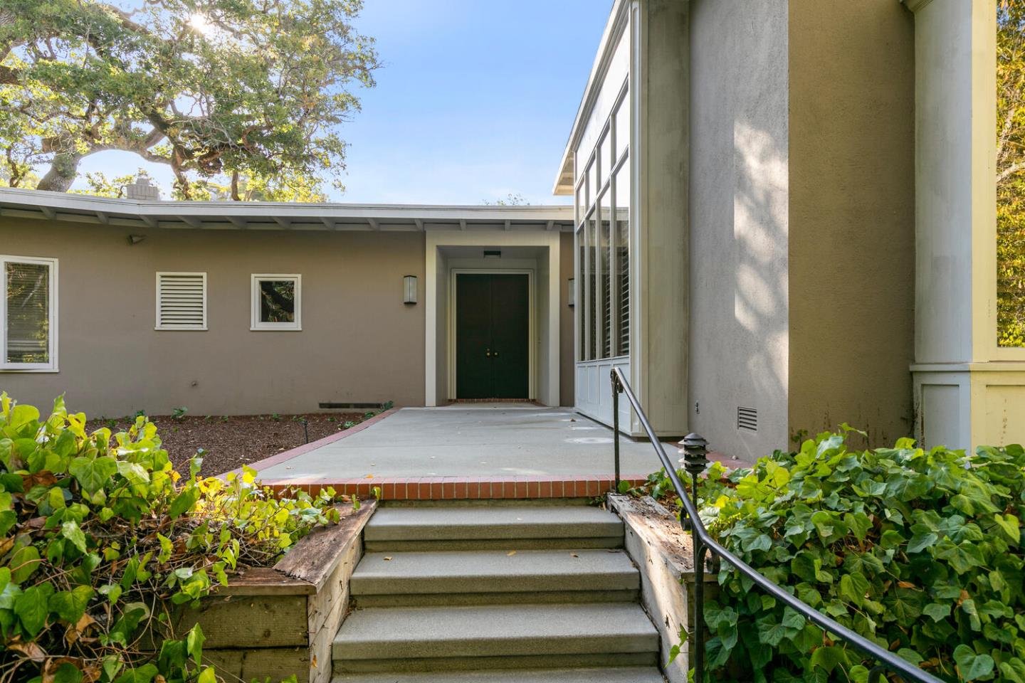 170 Bridge Road Hillsborough, CA 94010 - Photo 2 of 15 a front view of a house with a yard