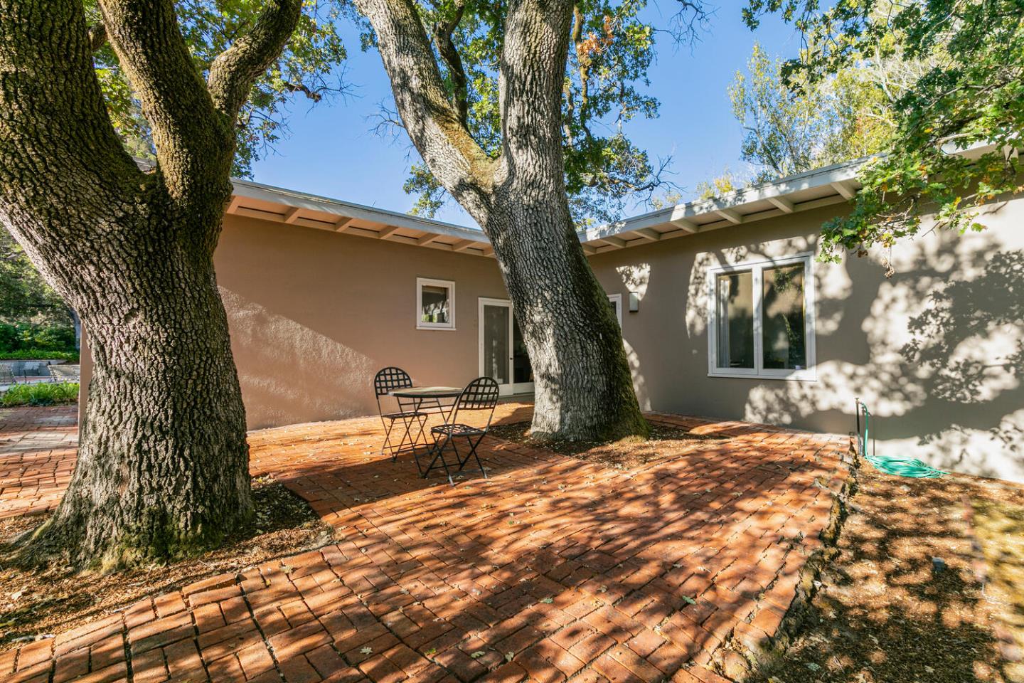 170 Bridge Road Hillsborough, CA 94010 - Photo 8 of 15 a front view of a house with a yard