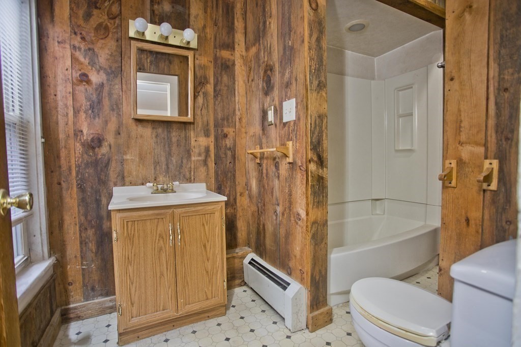 95 School Street Warren, MA 01083 - Photo 14 of 41 a bathroom with a granite countertop sink toilet and shower
