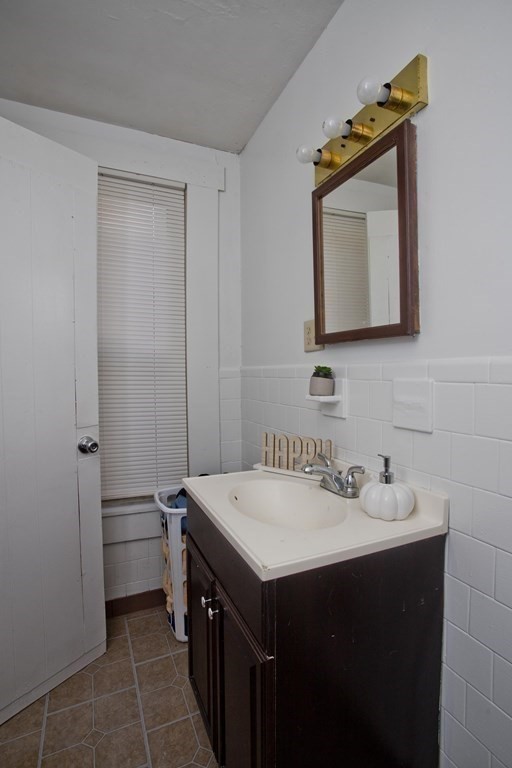 95 School Street Warren, MA 01083 - Photo 25 of 41 a bathroom with a sink and a mirror